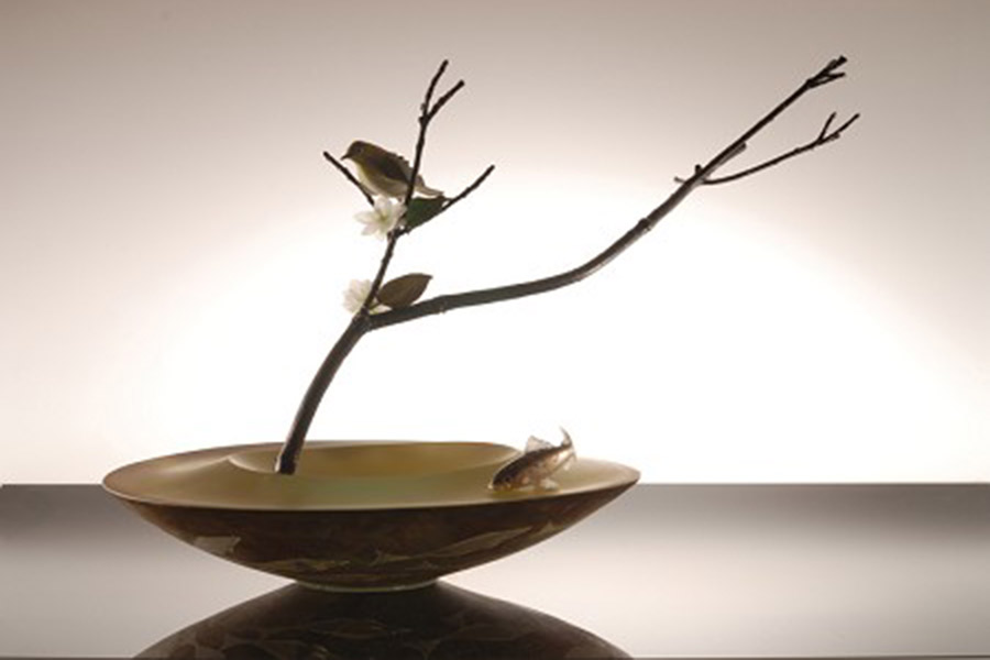 Yamanos+new+style+of+artwork+features+delicate%2C+tiny+sculptures+of+birds+and+flowers.+His+work+will+be+on+display+until+April+26.+
