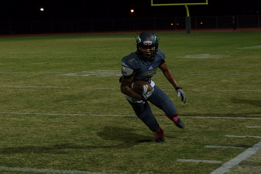 Wide receiver Callen Hightower catches a pass and runs for an Artichoke first down. Courtesy of Nicholas Tirella