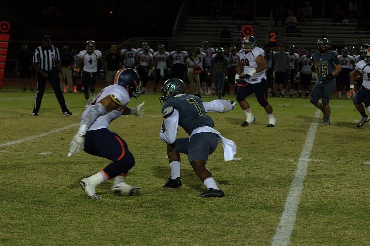 Wide receiver Thaddeus Thompson (#7) jukes a Snow College defender and runs for an Artichoke first down. Nicholas Tirella/Scottsdale Chronicle