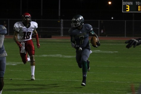 Artichokes cornerback Curtis Taylor runs with the ball towards the end zone after an interception. The Artichokes recorded four interceptions during their 35-27 win over Glendale.