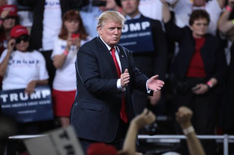 Donald Trump speaking with supporters at a campaign rally at Veterans' Memorial Coliseum at the Arizona State Fairgrounds in Phoenix, Ariz.