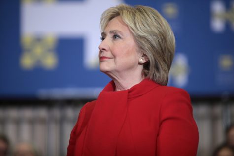 Former Secretary of State Hillary Clinton speaking with supporters at a "Get Out the Caucus" rally at Valley Southwoods Freshman High School in West Des Moines, Iowa.