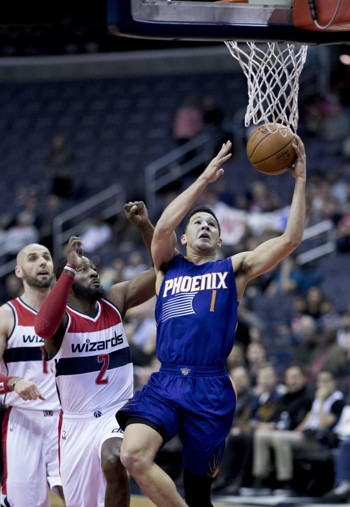 Phoenix Suns guard Devin Booker going up to score a lay-up