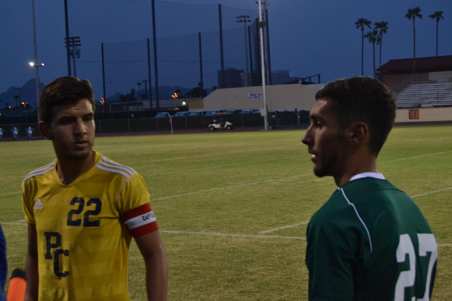 Captains, Ariel Aguas from Phoenix Community College (left) and Reece Harmbly from SCC (right), during match toss.