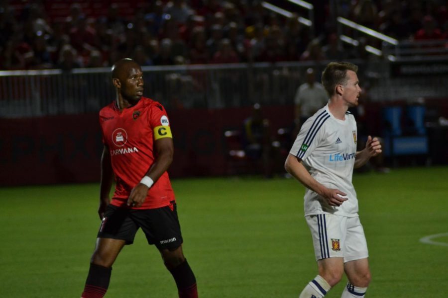 Didier Drogba carefully marked by Real Monarchs defender.