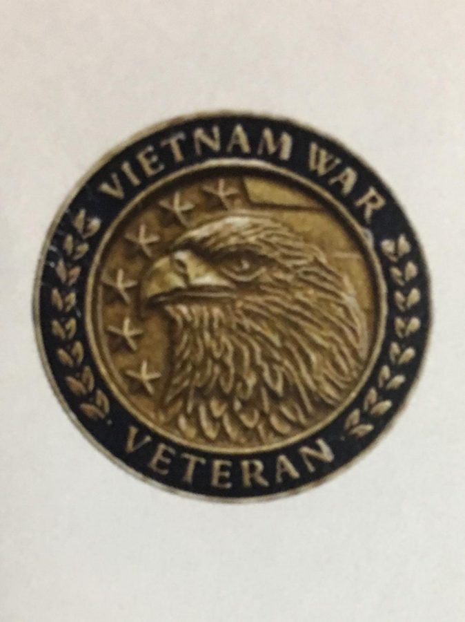 The commemoration pin that was given out to the veterans 