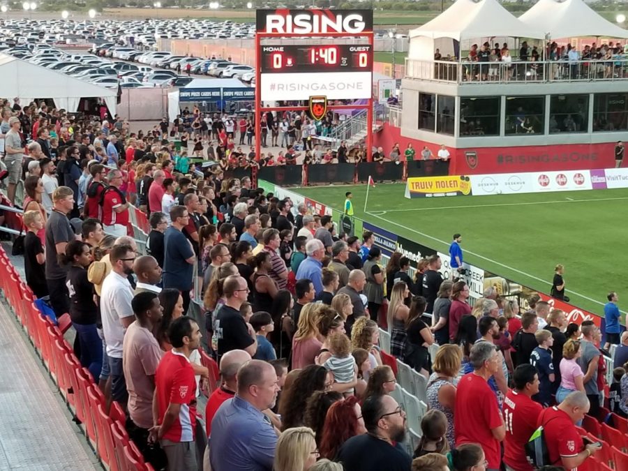 Rising fans stand together for our National Anthem before Fridays game