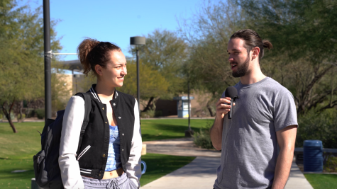 Reporter Tyler Buckland interviewing SCC student on campus.