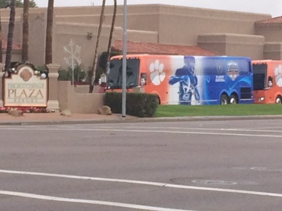 Clemson team busses lined up outside The Scottsdale Plaza Resort