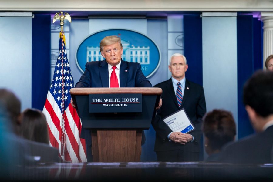 President Donald J. Trump, joined by Vice President Mike Pence and members of the White House Coronavirus Task Force, listens to a reporter’s question at the coronavirus (COVID-19