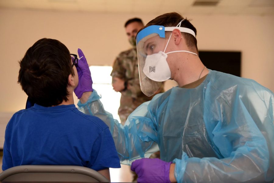 Arizona National Guard service members prepared and collected COVID-19 test samples before transporting them to a state lab for testing at Sunsites, Ariz., Sept. 20, 2020