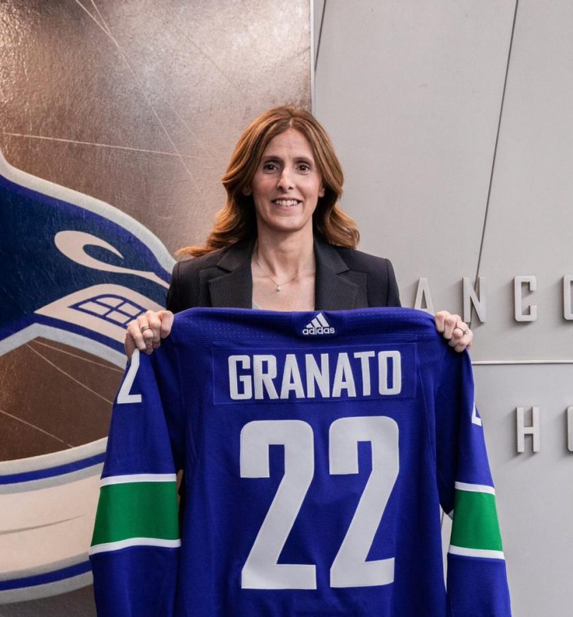 Former+Olympic+gold+medalist%2C+and+the+captain+of+the+first+womens+U.S.+gold+medal+team%2C+Cammi+Granato+poses+with+her+jersey+after+being+introduced+as+AGM+with+the+Vancouver+Canucks.