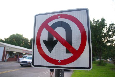 Sign discouraging u-turns
