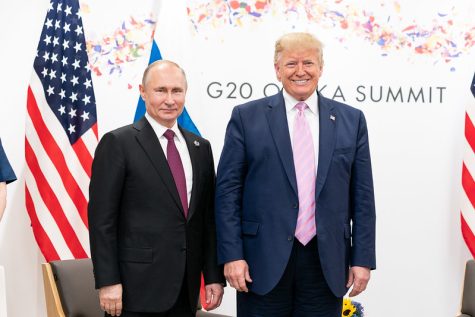 President Donald J. Trump welcomes President of the Russian Federation Vladimir Putin as he arrives to attend their bilateral meeting during the G20 Japan Summit Friday, June 28, 2019, in Osaka, Japan. 