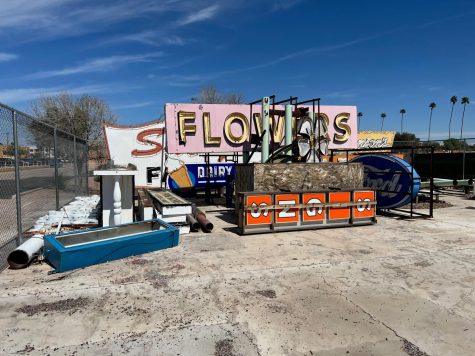 Historic neon signs await restoration at the storage area in Mesa, Ariz.