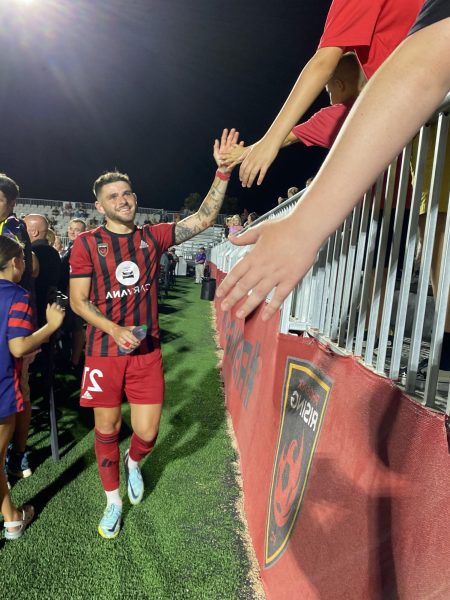 Panos Armenakas celebrates with fans after Saturdays 5-0 victory over El Paso.
