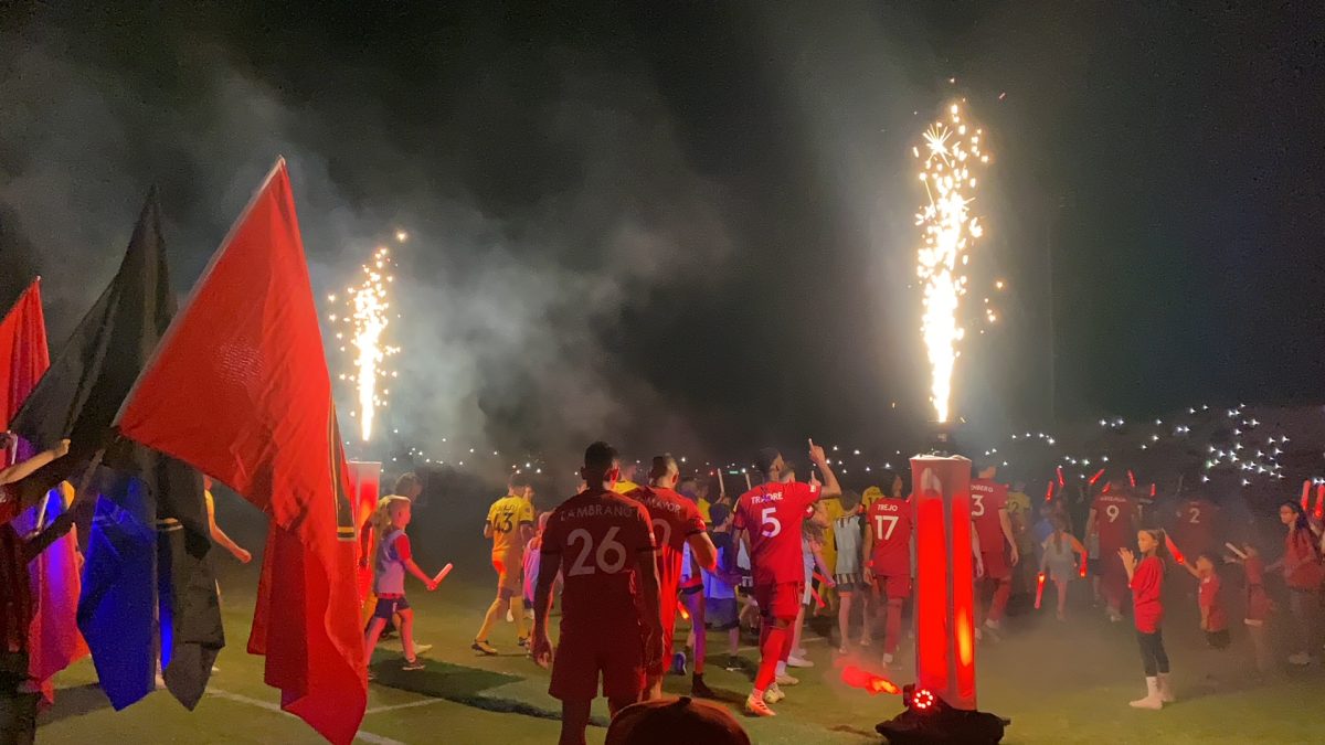 Rising players enter the pitch before Saturdays final regular-season home game