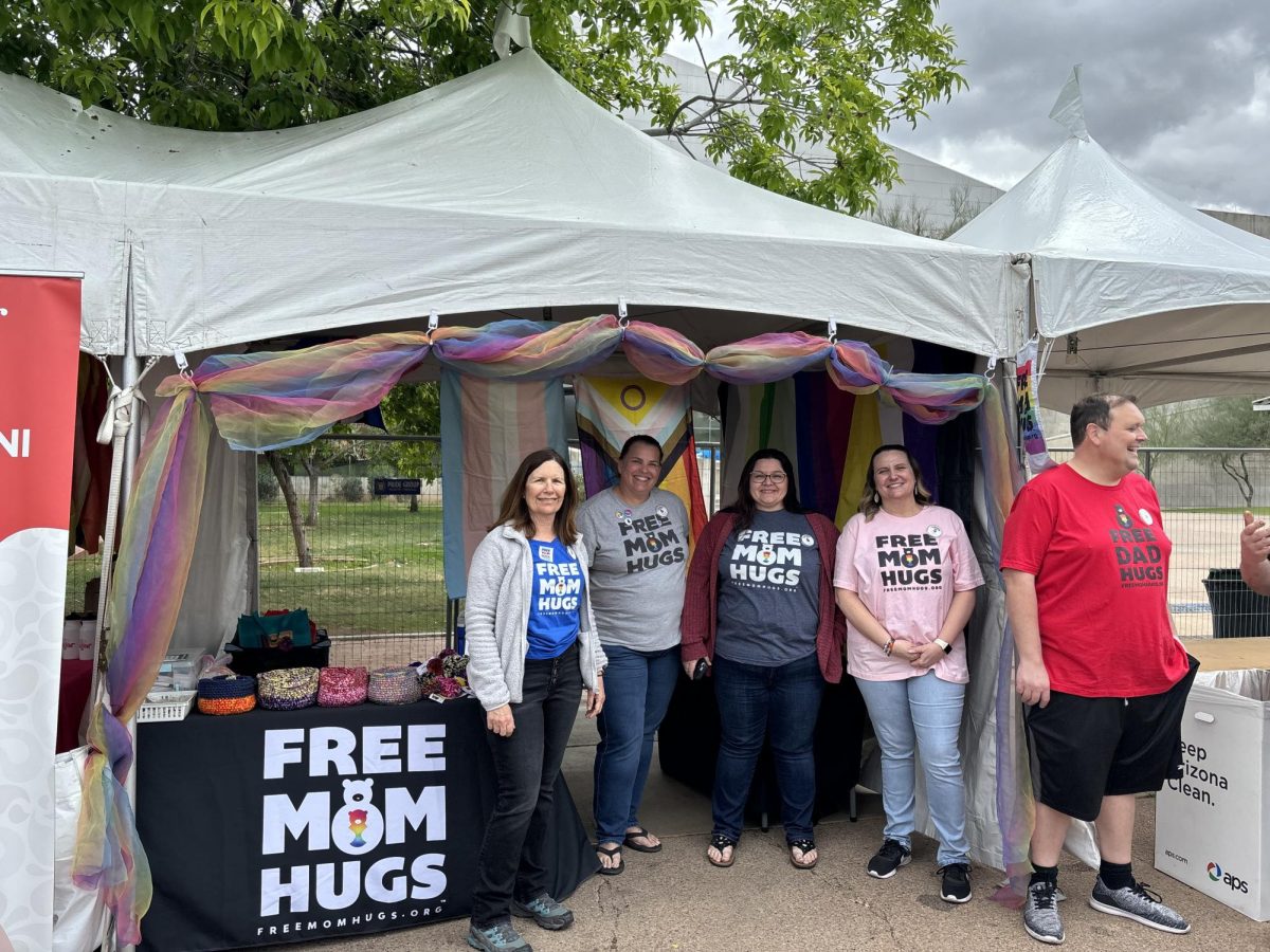A Free Mom and Free Dad Hugs booth 
