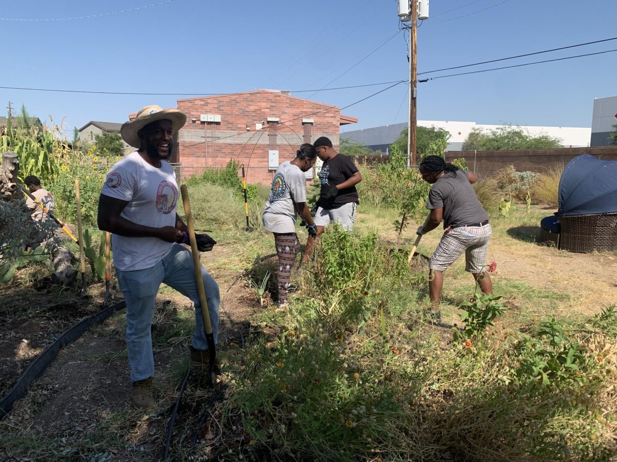 Rodney Smith, along with community members, meet weekly at the Brook's People Garden to find community and promote a healthier planet. 