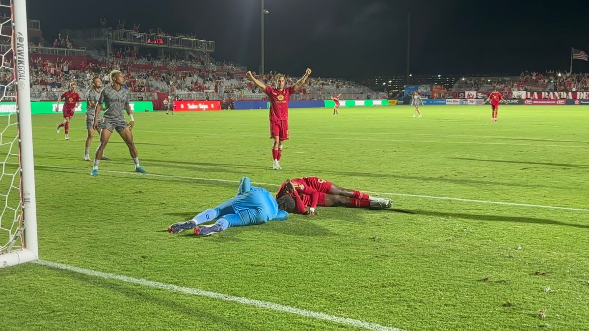 Remi Cabral and Raiko Arizarena lay on the ground after a scary collision following Cabral's second half goal.