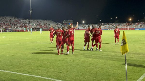 Rising celebrate after Tomas Angel scored.