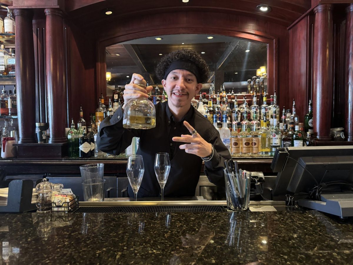 Miguel Rizo, a proud immigrant to the Valley working as one of the head bartenders at Village Tavern in Scottsdale.