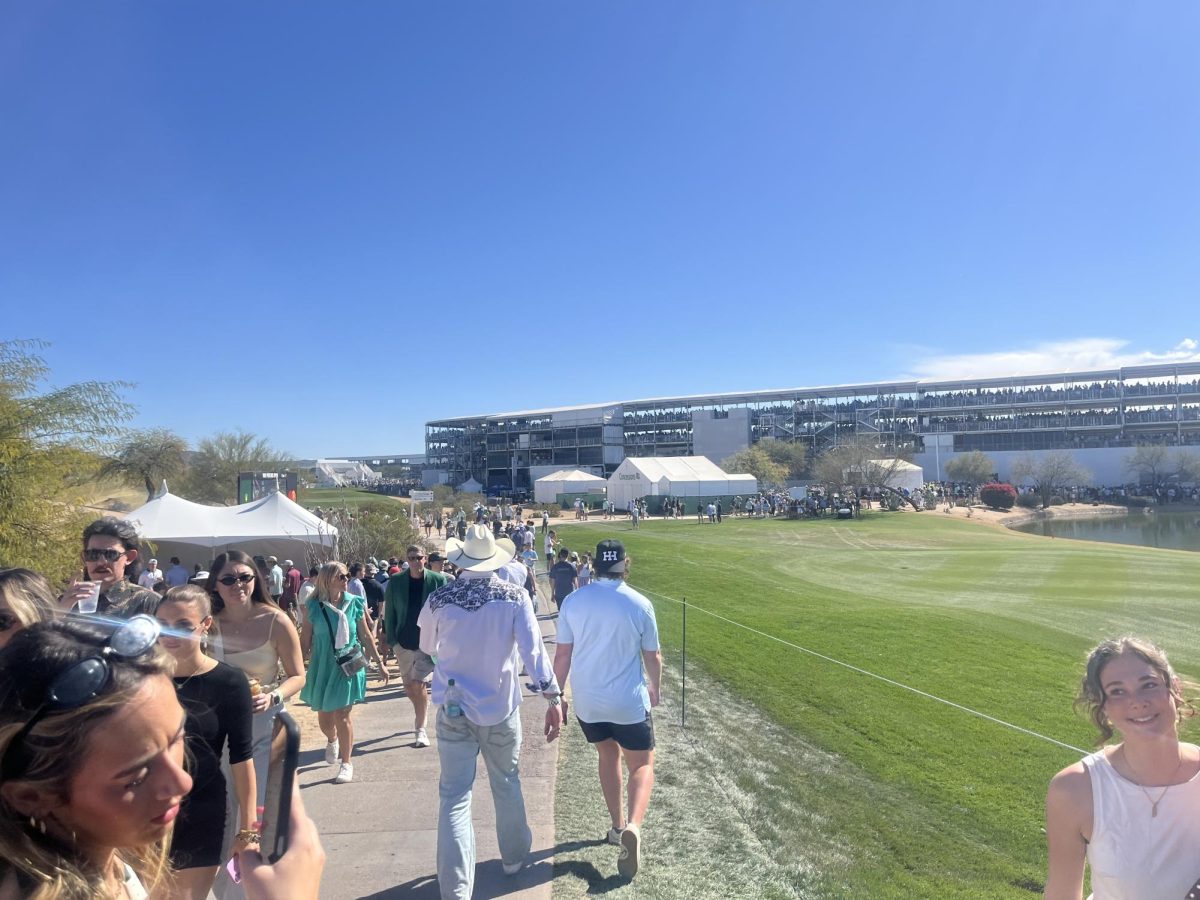 Golfers making their way to the next tee