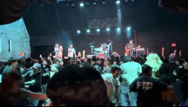 People moshing at the Red Pears concert.