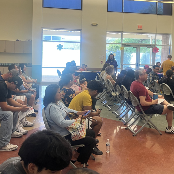 Families line up at the Tucson passport fair at El Pueblo Center